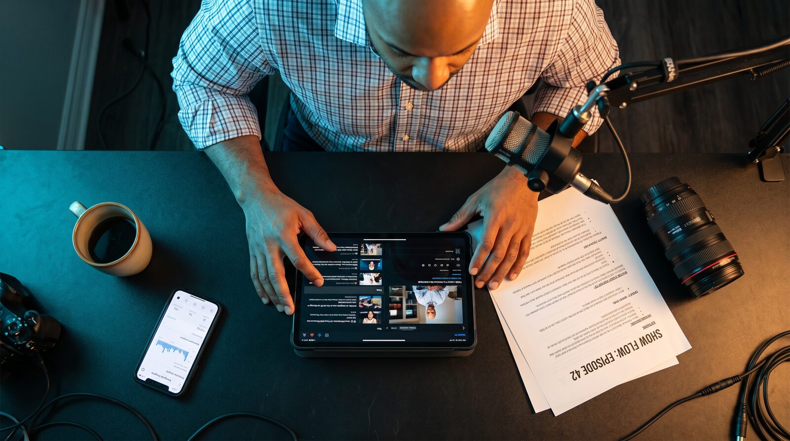 Dr. Bullard reviewing content across multiple platforms — one show becomes daily presence